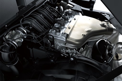 Top-down view of a side x side engine from inside the engine compartment. opens in a new window