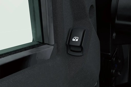 Detail view of interior power window control switch of a side x side. opens in a new window