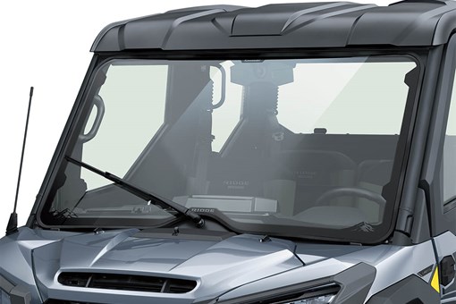 Front view of a windshield of a side x side staged in a white studio background. opens in a new window