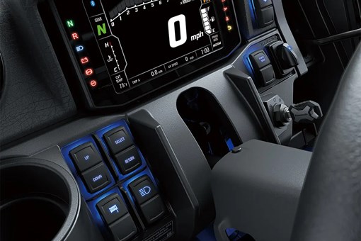 Interior detail of a side x side's dashboard with accent lighting. opens in a new window