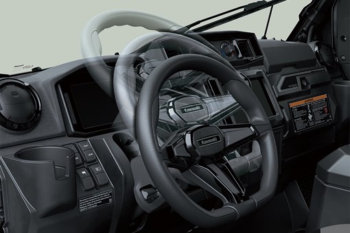 Interior angle view showing adjustability of the steering wheel of a side x side. opens in a new window
