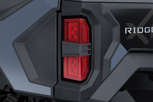 Detail view of rear left brake light of a side x side. opens in a new window