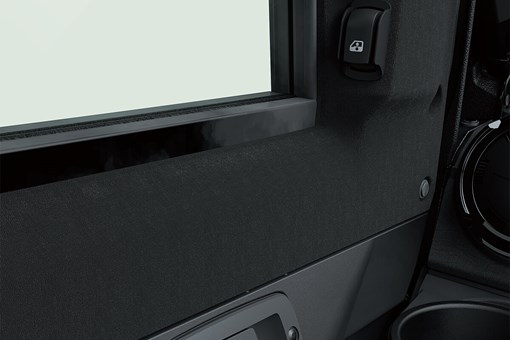 Interior door handle, cup holder and power window control switch of a side x side. opens in a new window