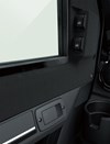 Interior door handle, cup holder and power window control switch of a side x side.