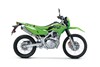 Right side view of a green dual-sport motorcycle staged in a white studio background.