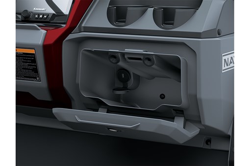 Close-up view of a charging port compartment in a Neighborhood Activity Vehicle. opens in a new window