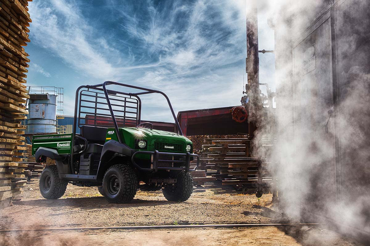 Three-quarter front angle of a side x side parked off-road.