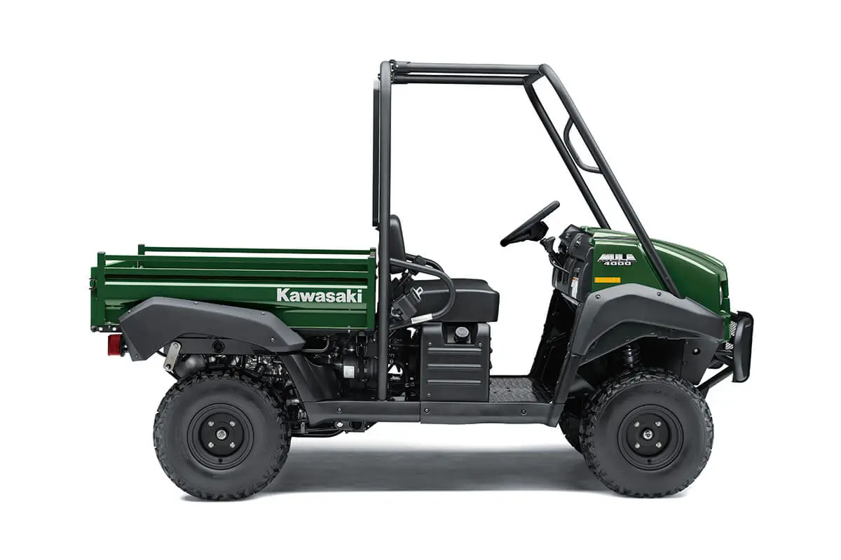 Profile angle of a green side x side staged in a white studio background.