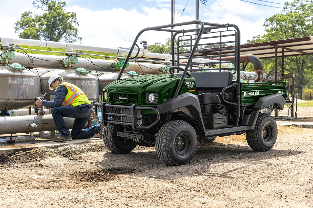 Three-quarter front angle of a side x side parked off-road.