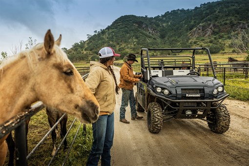 Front angle of a side x side parked on a ranch. opens in a new window