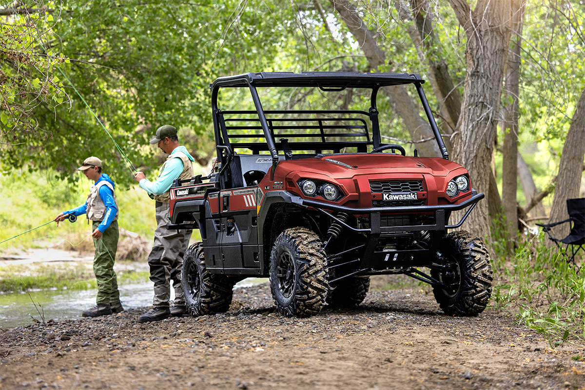 Three-quarter front angle of a side x side parked off-road.