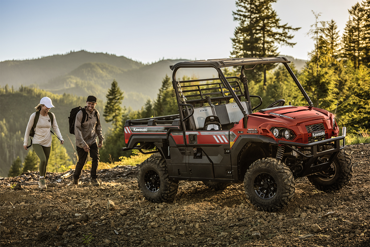 Side angle of a side x side parked off-road.