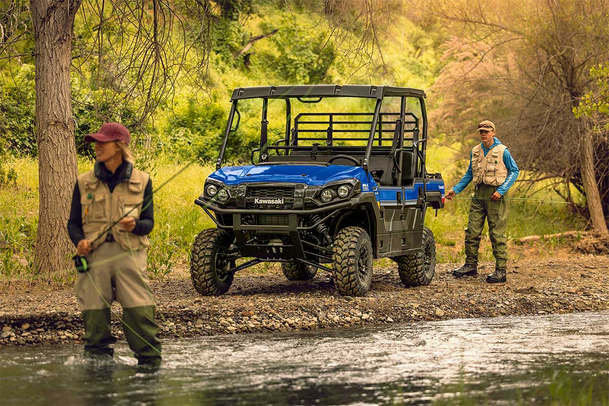 Three-quarter front angle of a side x side parked off-road.