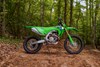 Profile angle of a motorcycle parked on an off-road course.