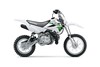 Side angle of a silver motorcycle staged in a white studio background.