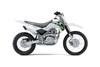 Side angle of a silver motorcycle staged in a white studio background.