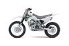 Profile angle of a silver motorcycle staged in a white studio background.