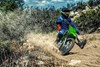 Front angle of a person riding a motorcycle off-road.
