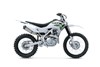 Side angle of a silver motorcycle staged in a white studio background.