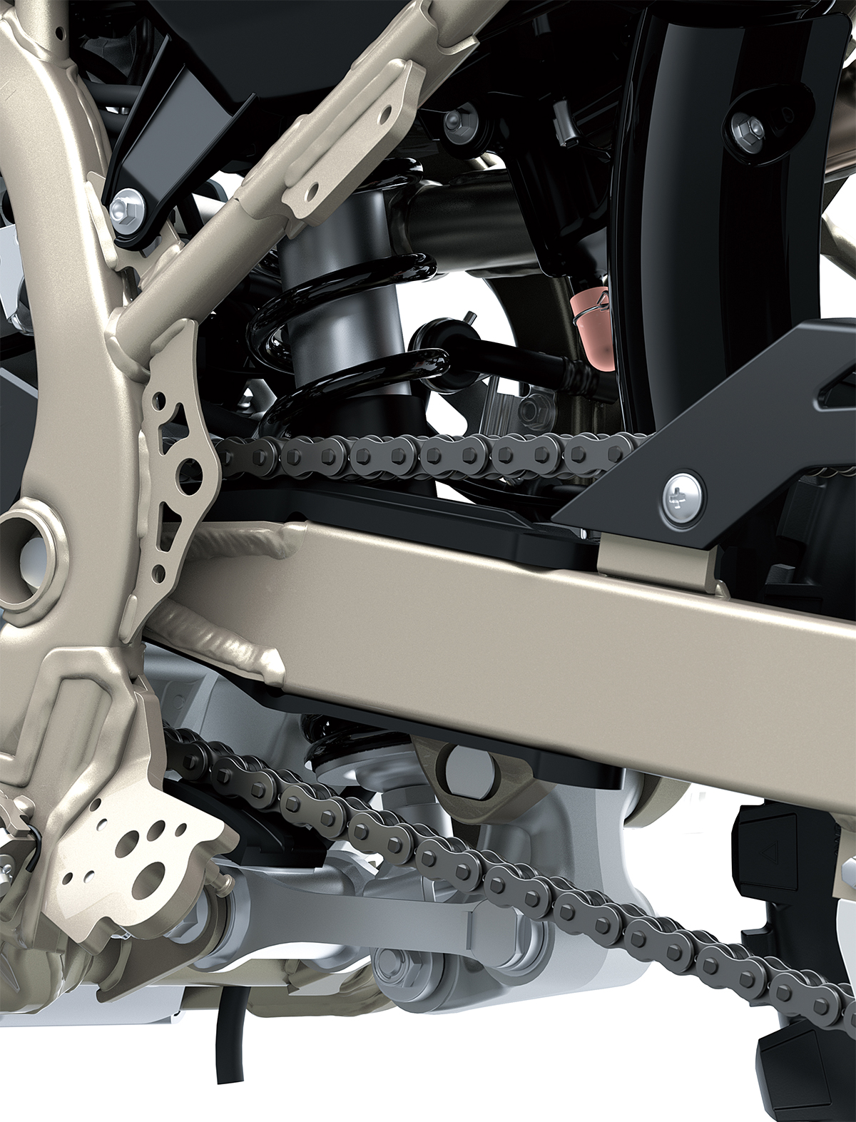 Close-up view of the chain of a motorcycle staged in a white studio background.