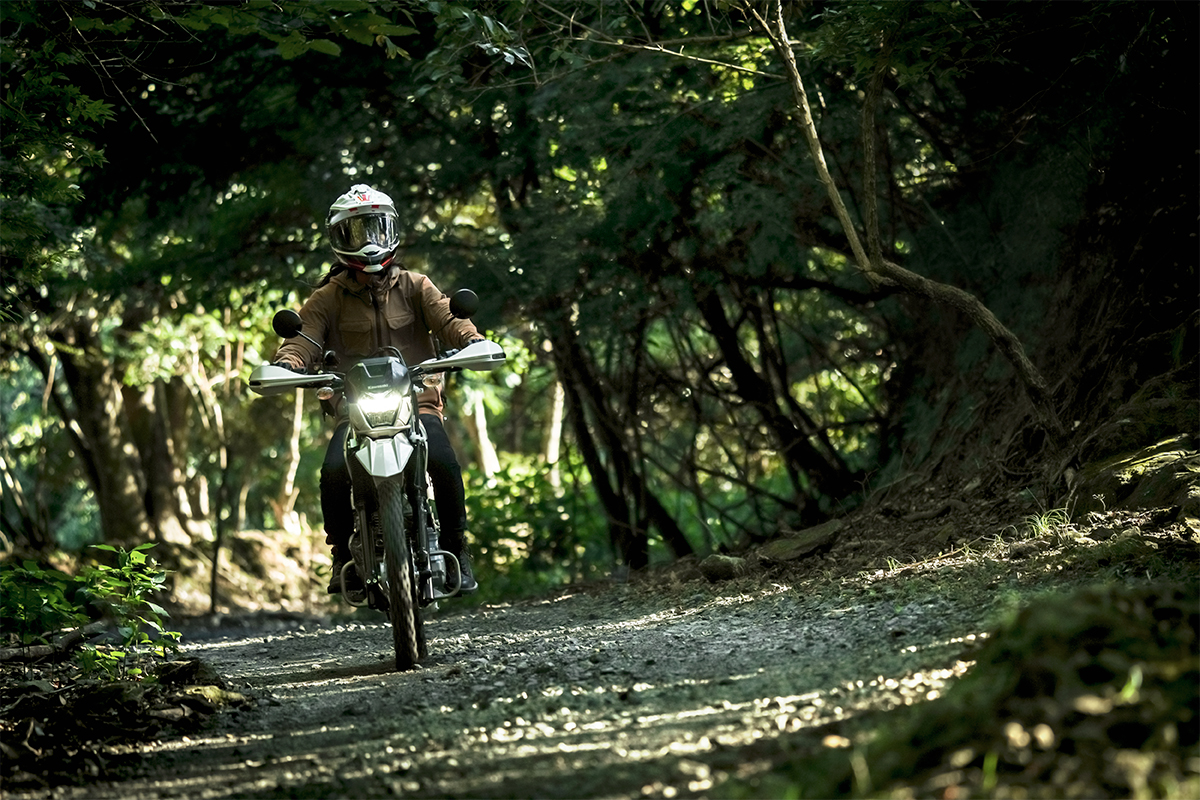 Front angle of a person riding a motorcycle off-road.