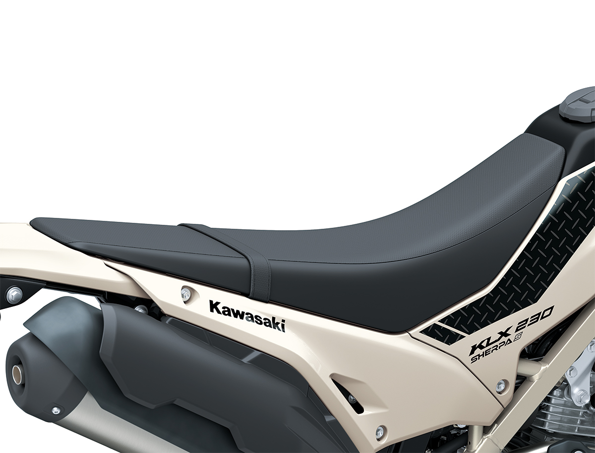 Close-up view of the seat of a motorcycle staged in a white studio background.