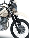 Close-up view of the front end of a motorcycle staged in a white studio background.