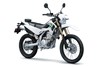 Three-quarter front angle of a silver motorcycle staged in a white studio background.