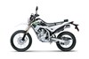 Side angle of a silver motorcycle staged in a white studio background.