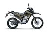 Side angle of a brown motorcycle staged in a white studio background.