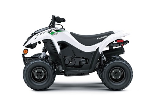 Profile angle of a white ATV staged in a white studio background. opens in a new window