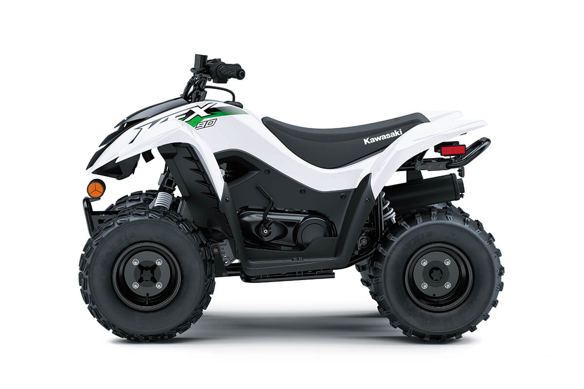 Profile angle of a white ATV staged in a white studio background.