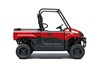 Profile angle of a red side x side staged in a white studio background.