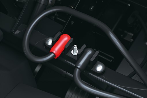 Close-up view of the battery terminal of a side x side staged in a white studio background. opens in a new window