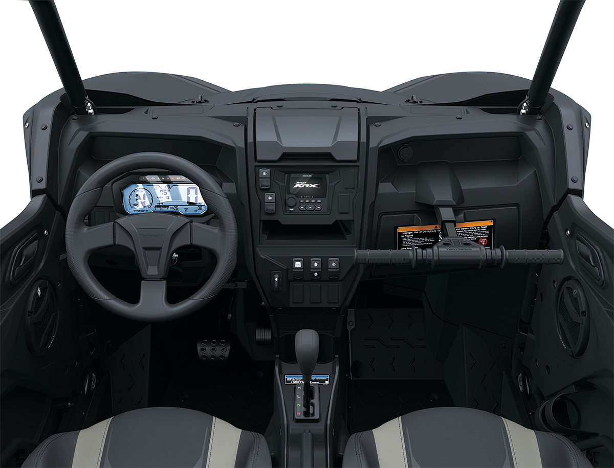 Center POV of the steering wheel and dashboard of a side x side staged in a white studio background.