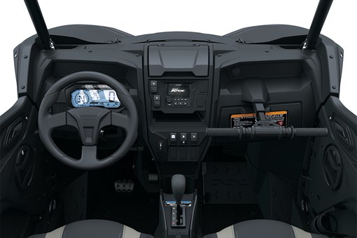 Center POV of the steering wheel and dashboard of a side x side staged in a white studio background. opens in a new window