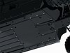 Close-up view of the skid plate of a side x side staged in a white studio background.