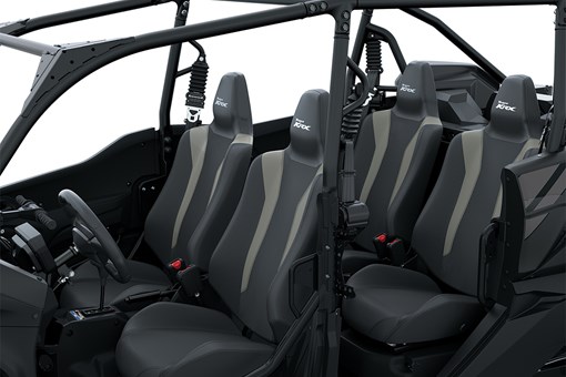 Three-quarter front angle of the four seats of a black side x side staged in a white studio background. opens in a new window