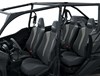 Three-quarter front angle of the four seats of a black side x side staged in a white studio background.