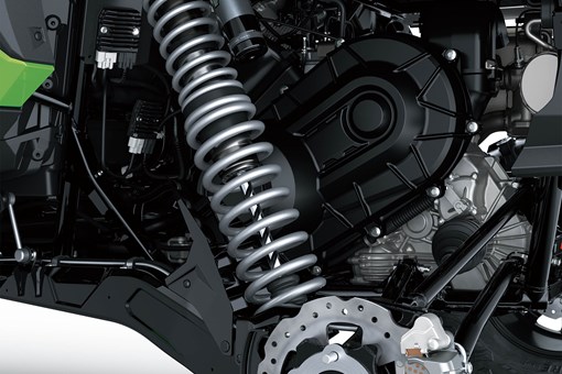 Another close-up of suspension of a side x side in a white studio background. opens in a new window