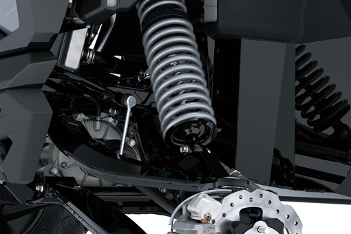 Close-up of suspension of a side x side in a white studio background. opens in a new window