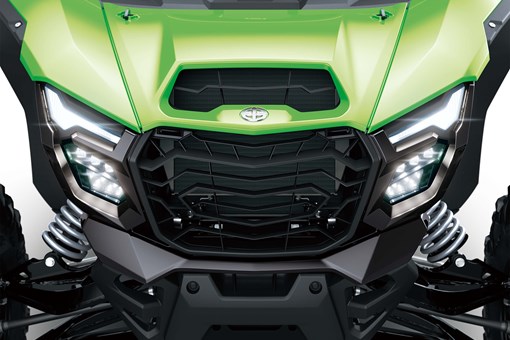 Close-up of the front end of a side x side in a white studio background. opens in a new window