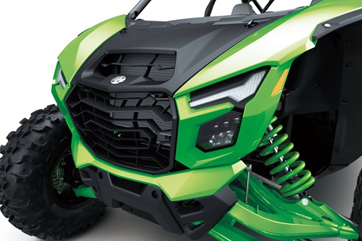 Close-up front three-quarter of the front end of a side x side in a white studio background. opens in a new window