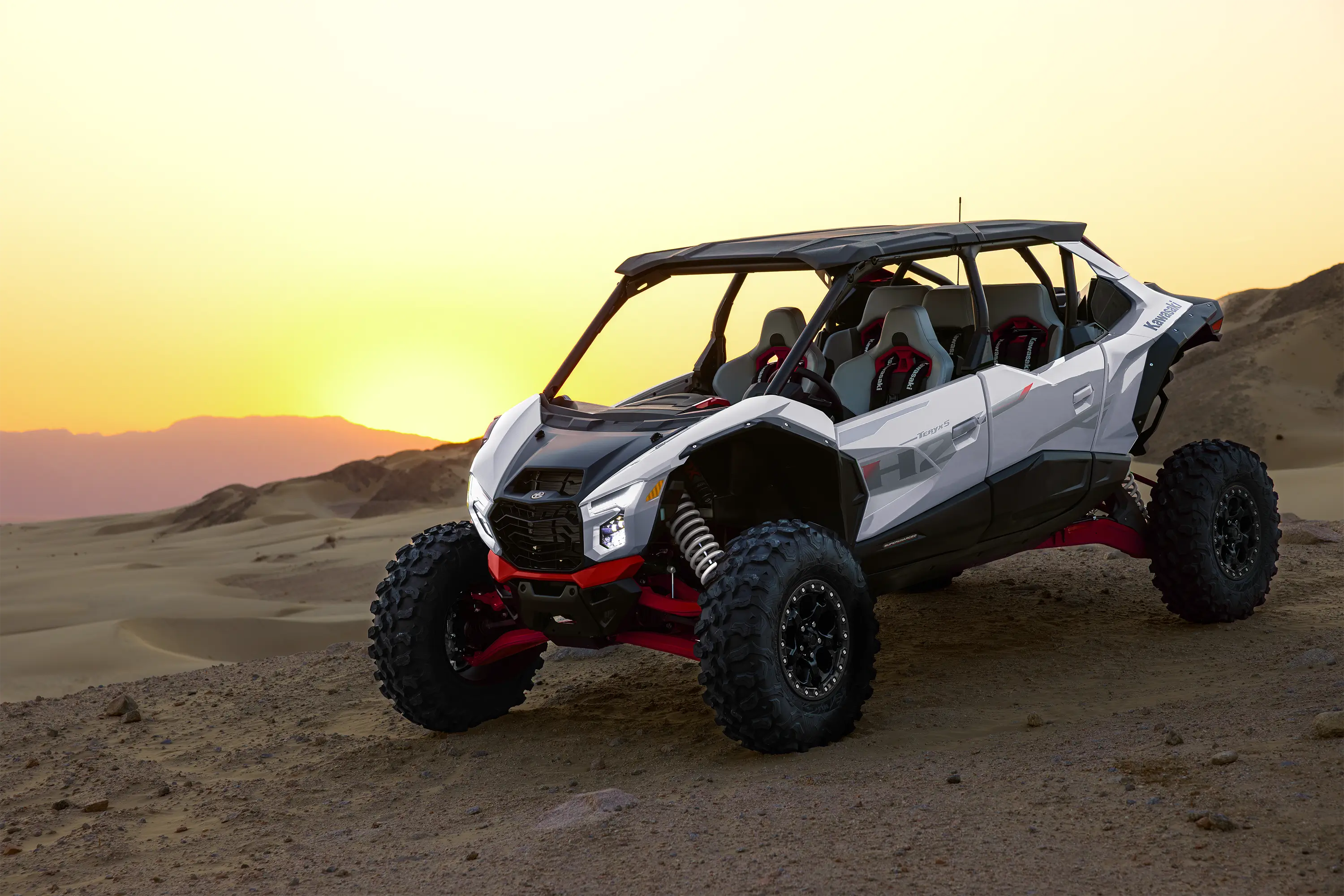 Three-quarter front angle of a side x side staged in a desert.