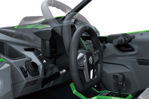 Example of steering wheel adjustability on a side x side in a white studio background. opens in a new window