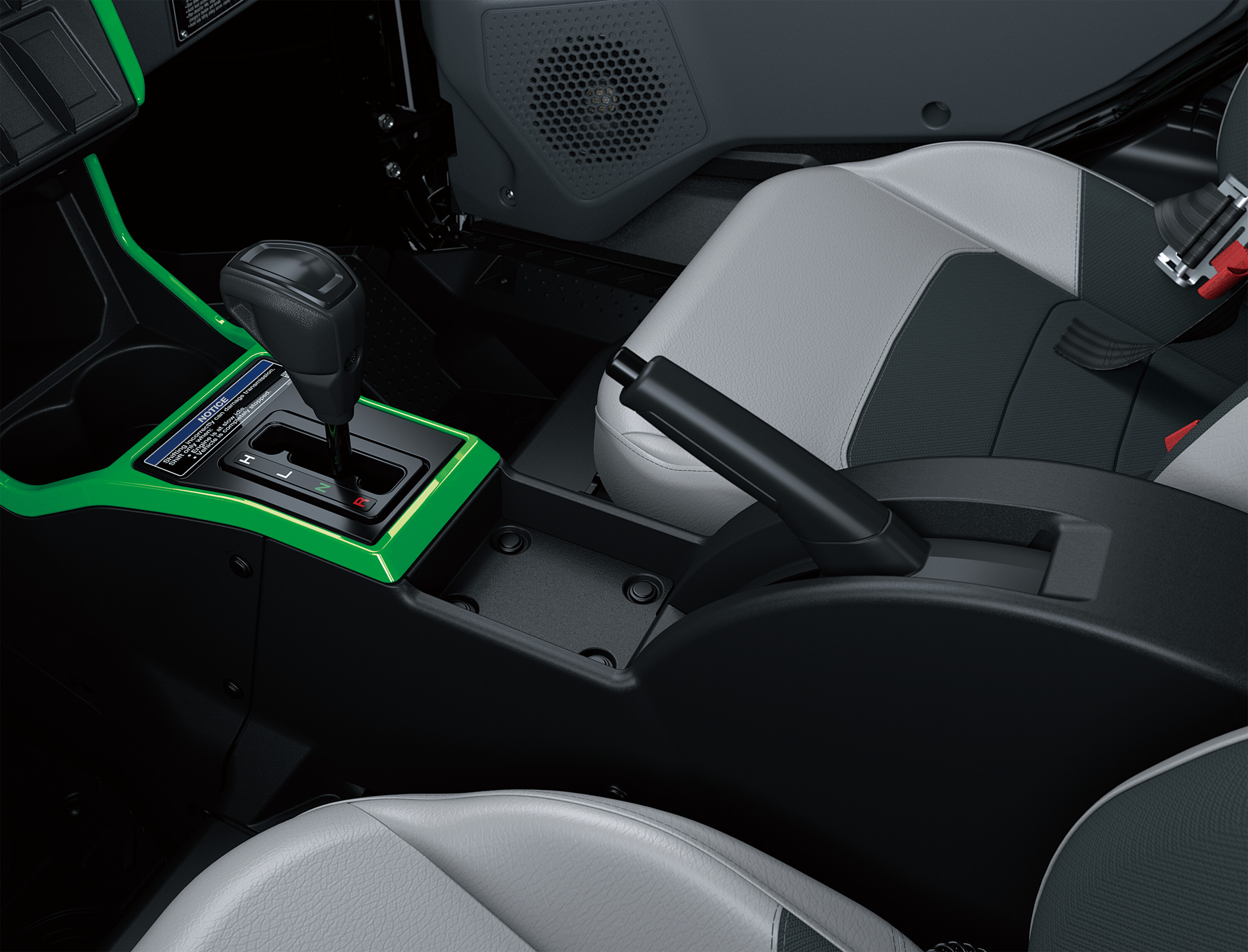 Close-up of the gear shift and brake lever of a side x side in a white studio background.