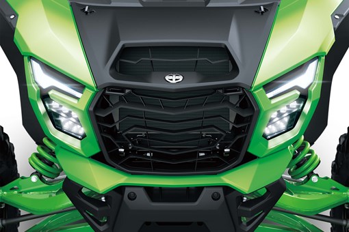 Close-up of the front end of a side x side in a white studio background. opens in a new window