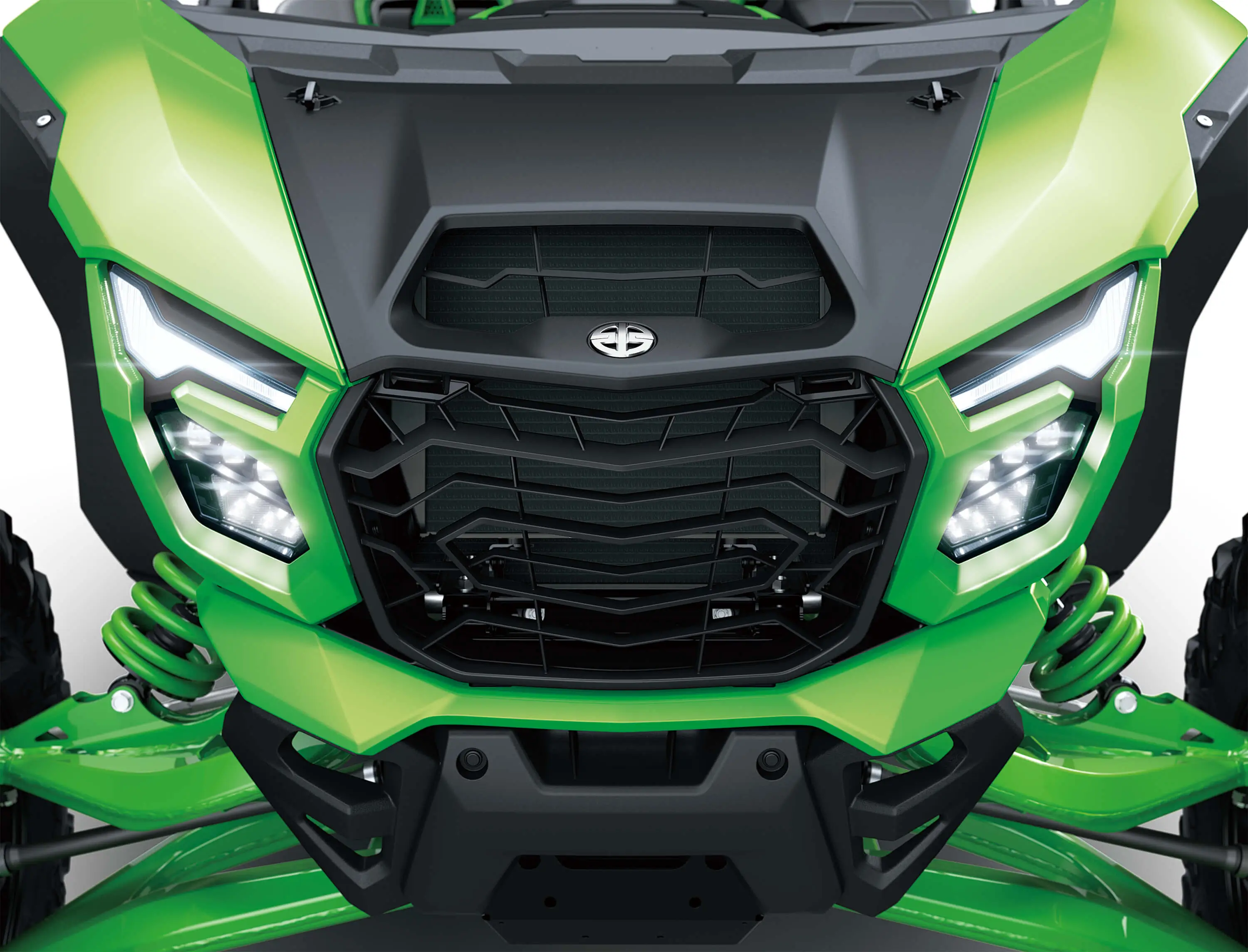 Close-up of the front end of a side x side in a white studio background.