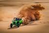 Overhead front angle of a person driving a side x side off-road.