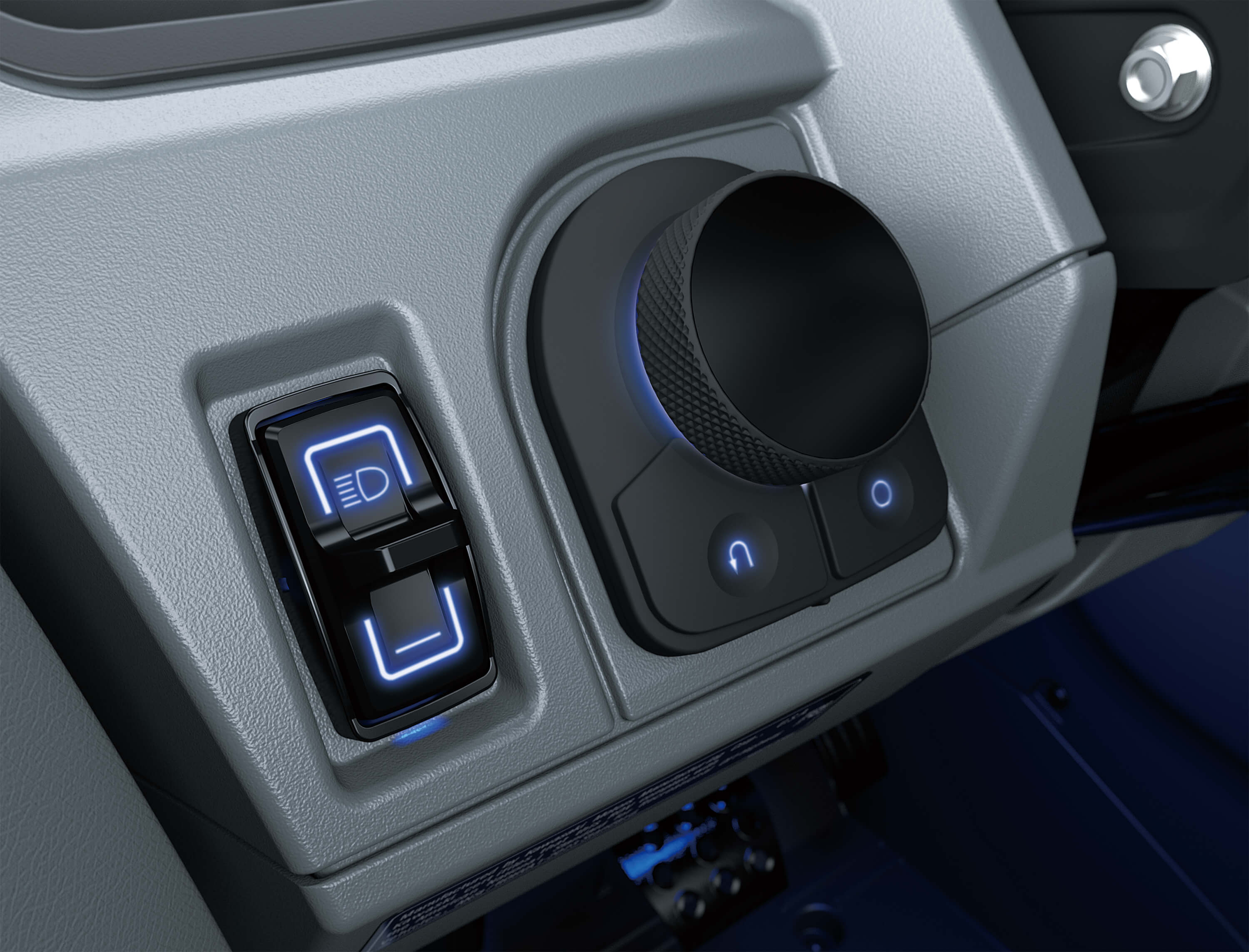 Close-up of interior controls on a side x side in a white studio background.